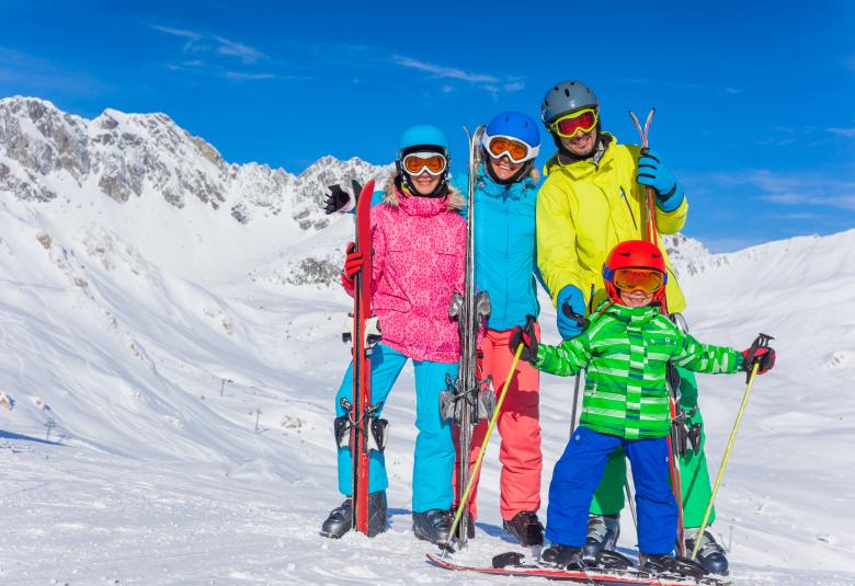 Happy family skiing