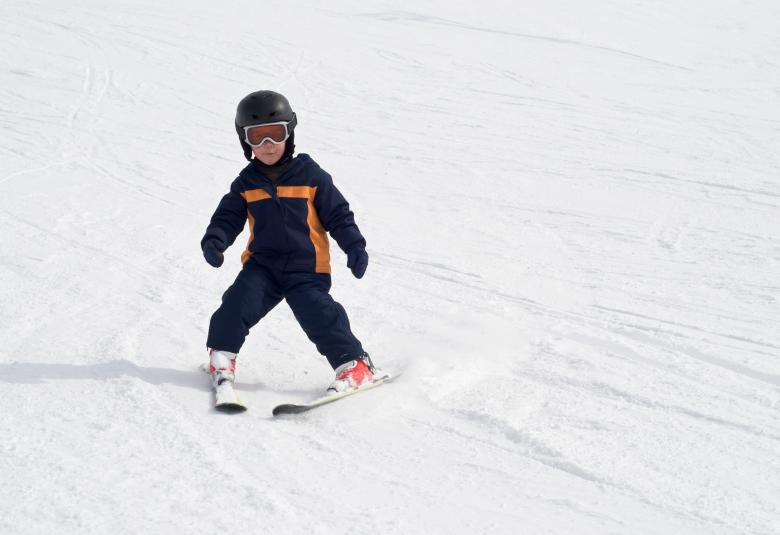 Kid learning to ski