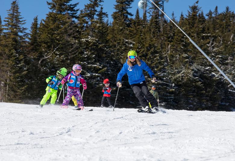 Kids on ski lessons