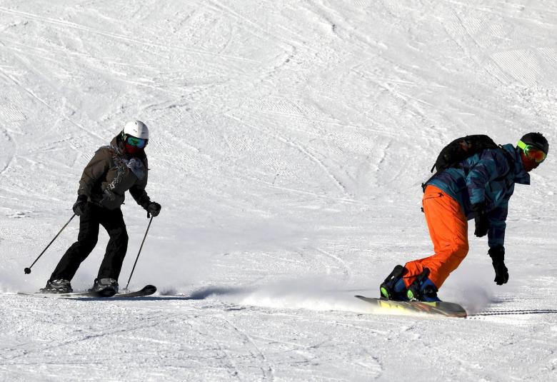 Snowboarding VS Skiing for Beginners