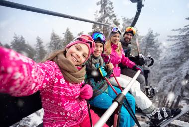 family on ski lift