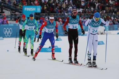 Skiers competing in Skitathlon