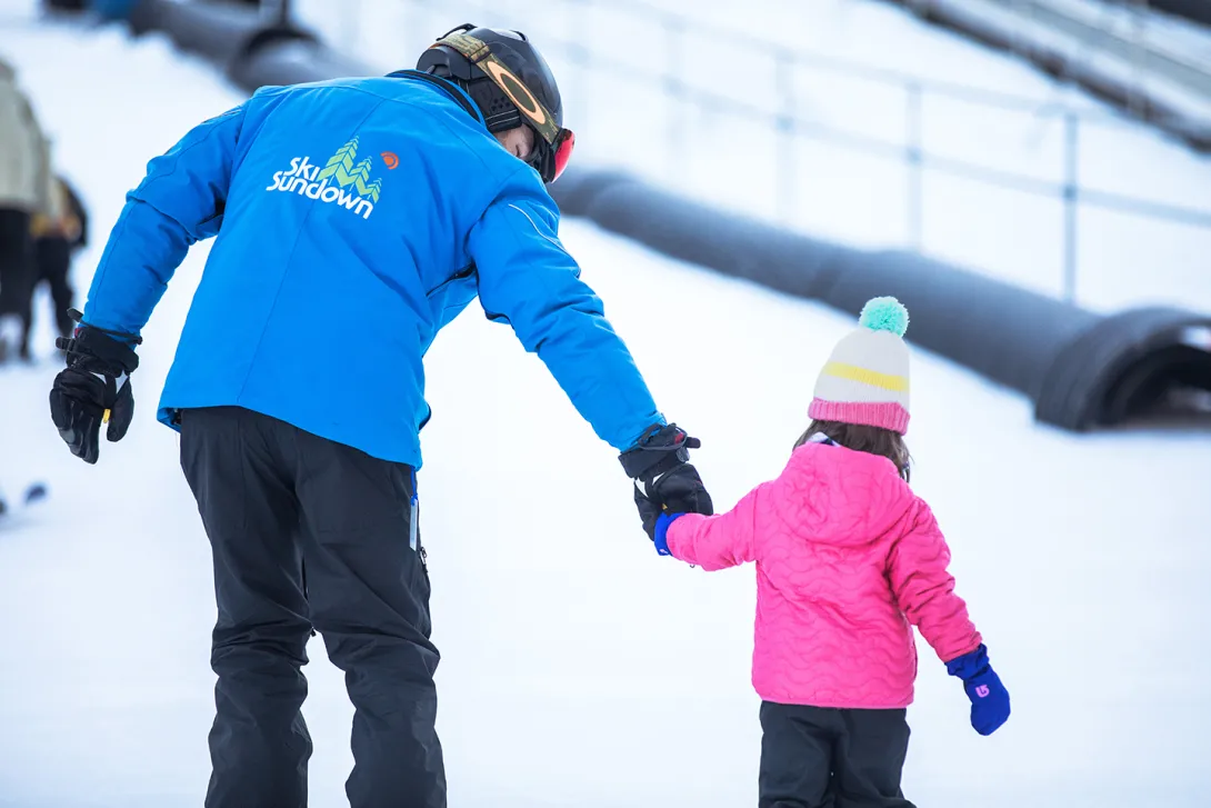 Ski Sundown helping kid