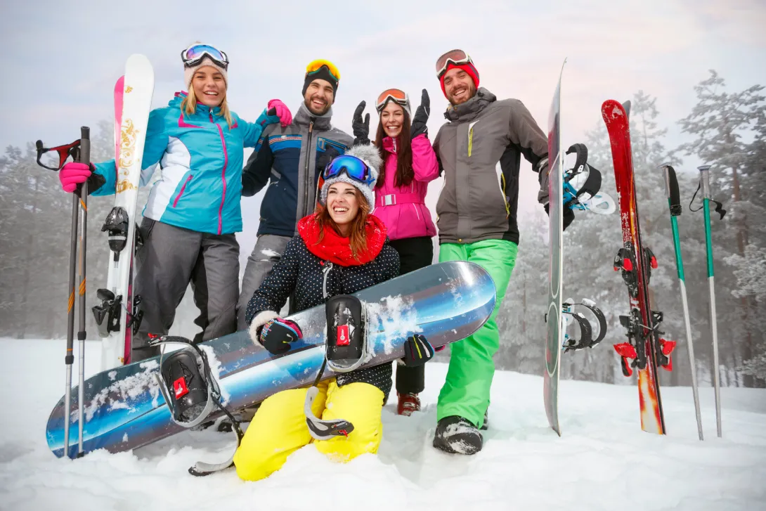 friends with ski and snowboard