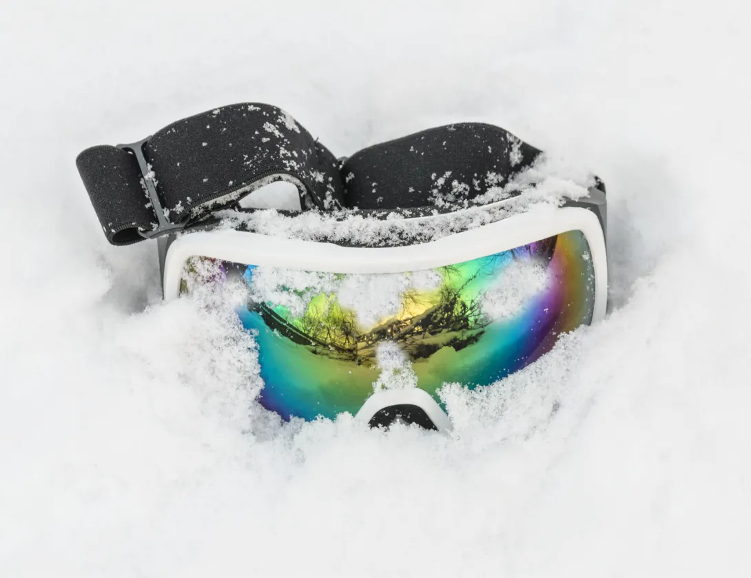 Ski goggles in the snow