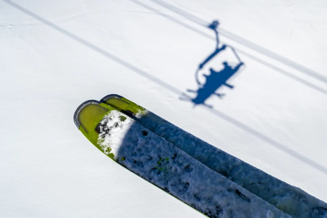 Skis with snow on top