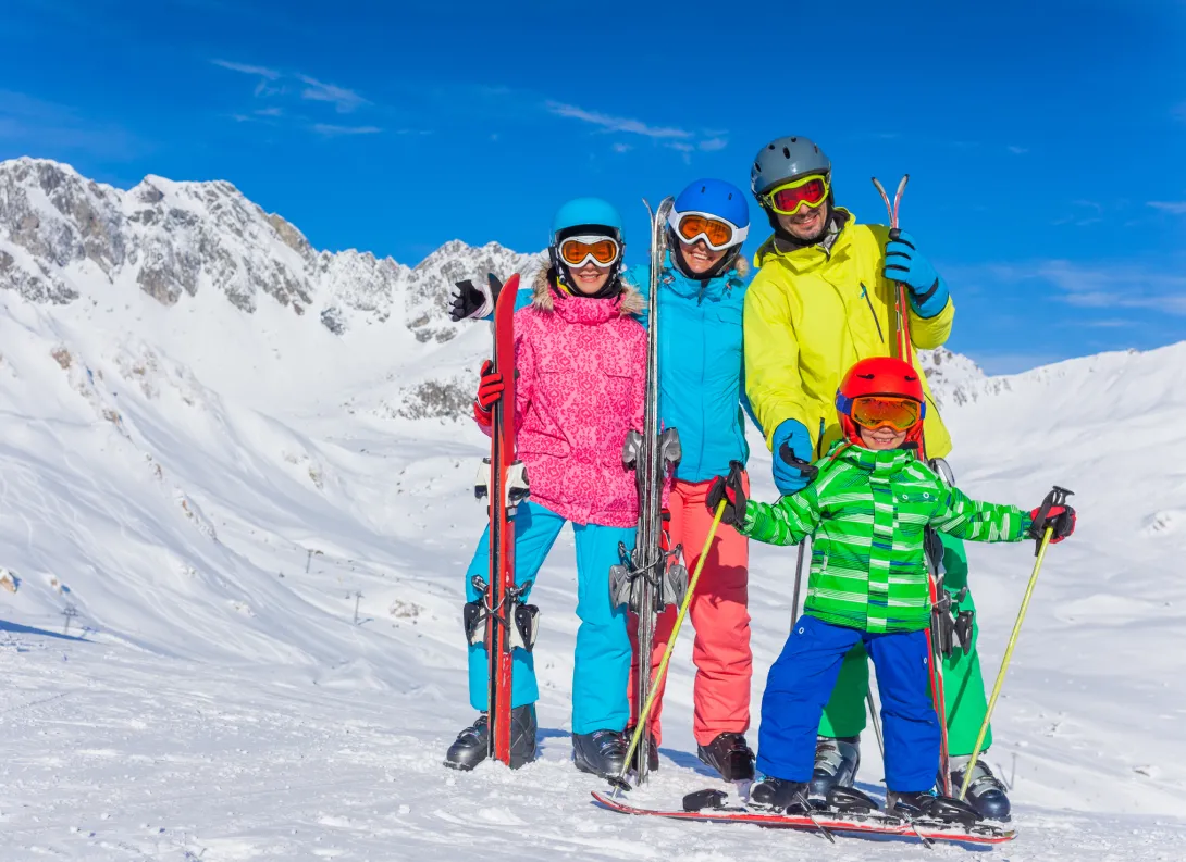 Happy family skiing