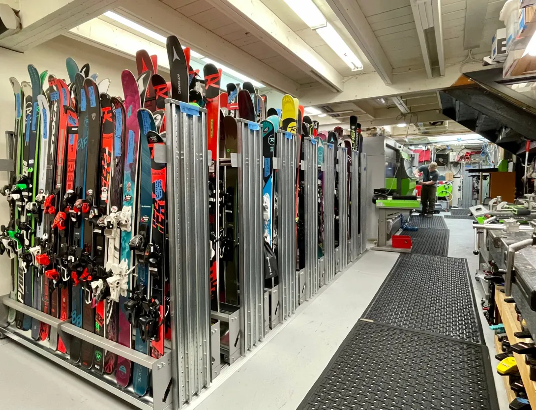 Skis in a rack to rent