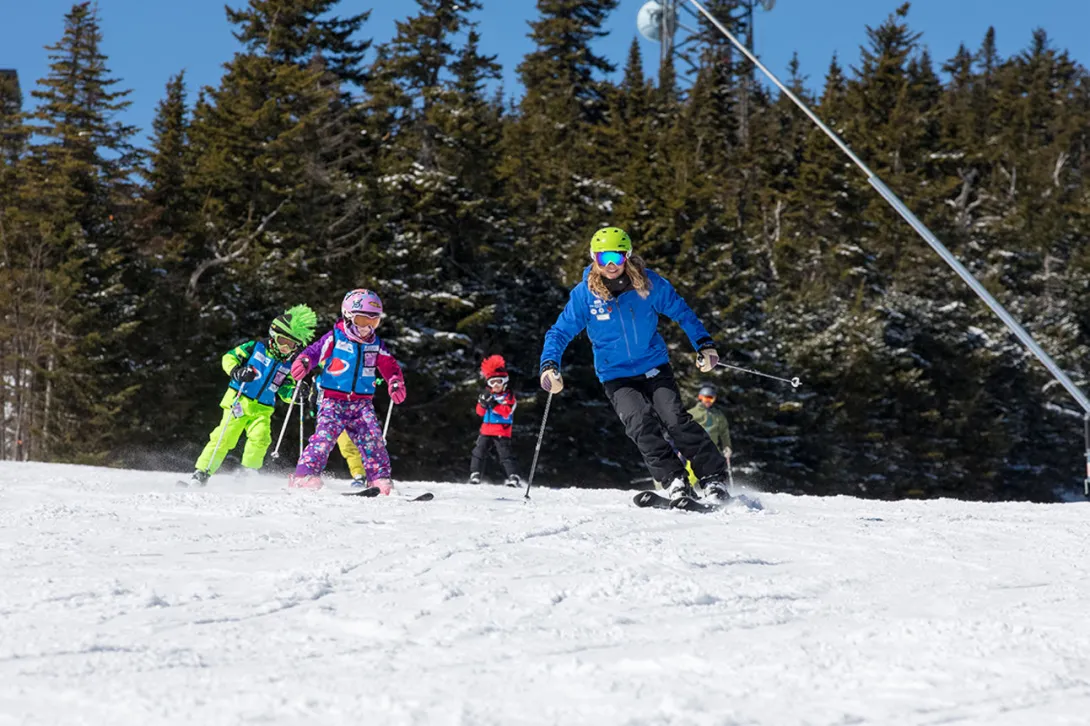 Kids on ski lessons